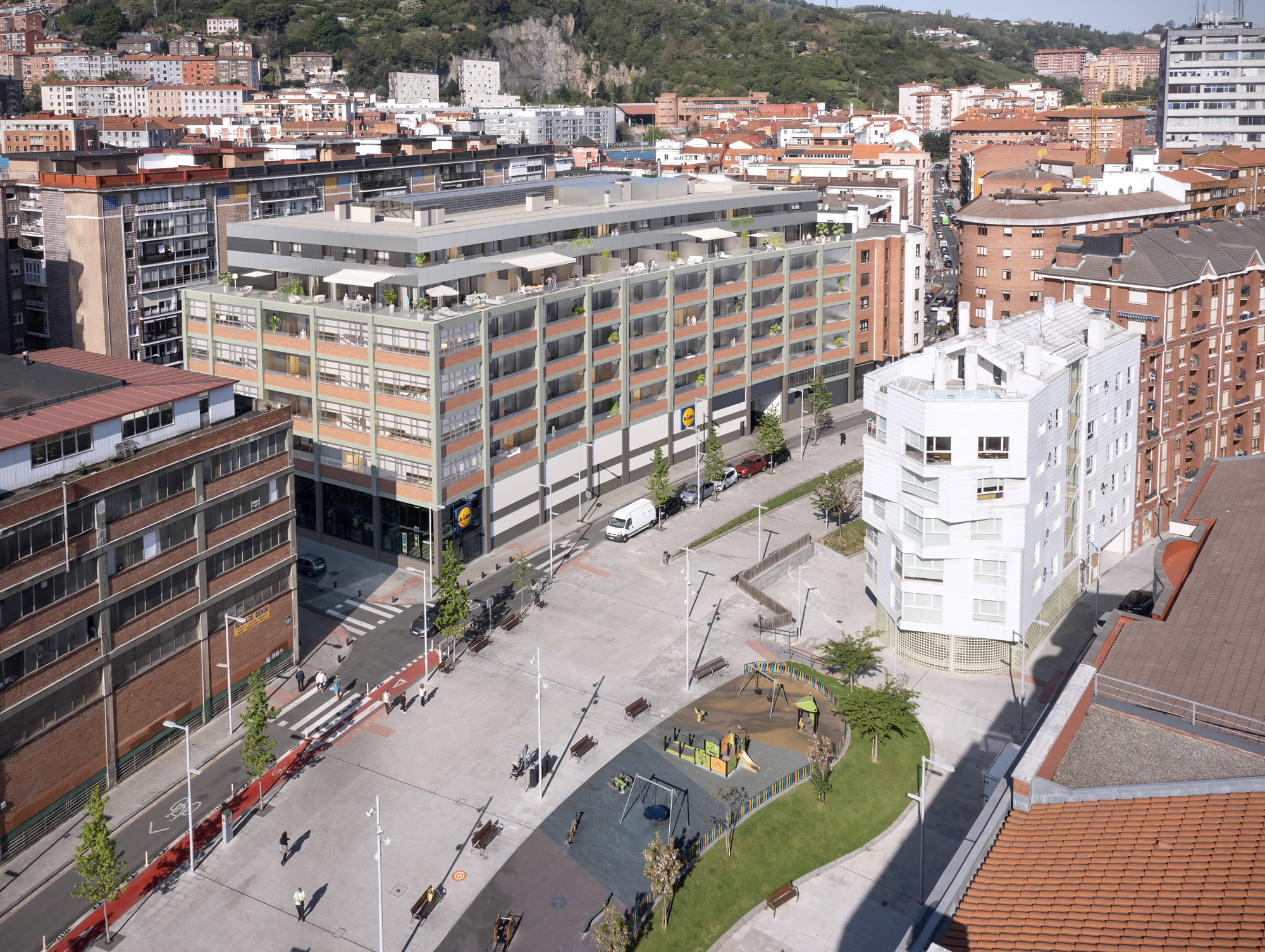 Vista aérea del edificio Moncada integrado en la trama urbana de Bilbao con áticos y terrazas